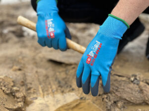 Tradie using Nexus GRIP DRY Water Resistant Gloves at Your Safety Factory