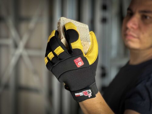 Tradie using Golden Hawk Deerskin Gloves and Golden Hawk Winterlined Gloves at Your Safety Factory