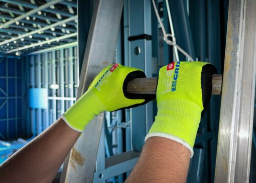 Tradie using Nexus GRIP Hi-Vis Gloves at Your Safety Factory